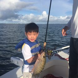 Captain Daniel Andrews Fishing Charters - Little Dylan and his first catch.
