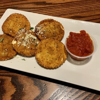 Budweiser Brew House - Toasted Ravioli Crispy raviolis served with parmesan cheese and marinara sauce - Sports Bars Near Me - Saint Louis, Missouri