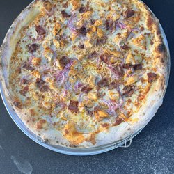 Redwings franks red hot sauce, diced season chicken, bacon, red onion, and ranch