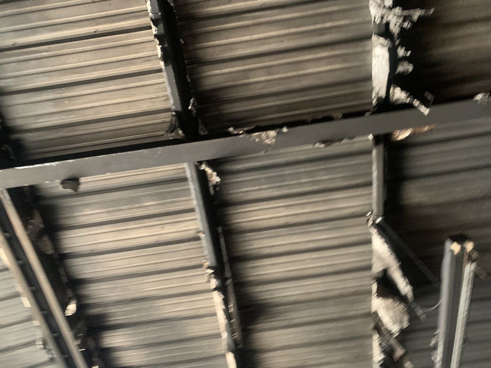 Slide of Structrum Roofing and Construction