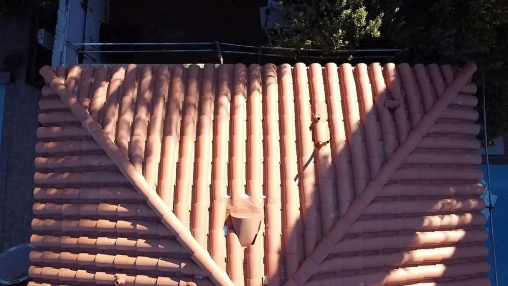 Slide of SLR Roofing