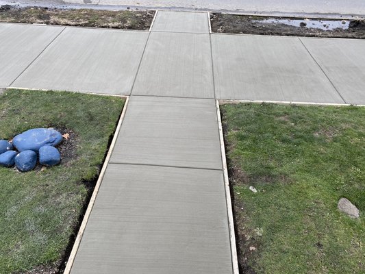 Before and After Sidewalk Replacement - This is a before/after of a sidewalk replacement.