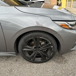 Mavis Tires & Brakes - Left and right front clearly show new tires.  Red dot.  Rear right is the same slow leaking tire!