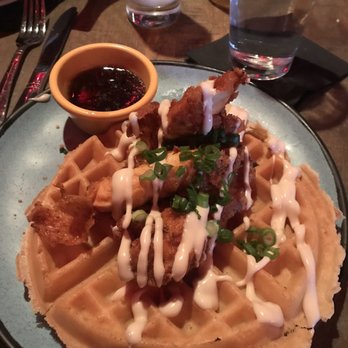 Saint Anejo - Chicken and waffles with Mezcal maple syrup. - Cocktail Bars Near Me - Nashville, Tennessee