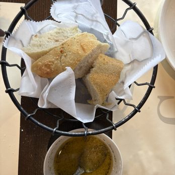 Carmela's Restaurant - Yummy bread with their oil.. o added grated parm.. salt and crushed red pepper! - Italian Near Me - Kingston, Massachusetts Carmela's Restaurant - Yummy bread with their oil.. o added grated parm.. salt and crushed red pepper! - Italian Near Me - Kingston, Massachusetts