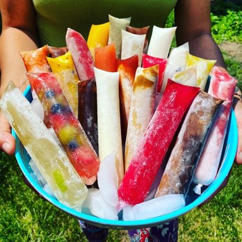Geladona - a person holding a plate of ice pops - Desserts Near Me - Toronto, Ontario Geladona - a person holding a plate of ice pops - Desserts Near Me - Toronto, Ontario