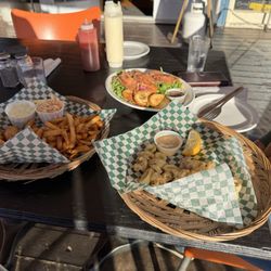 Bistro de la Baie - Fish and chips (bottom left), fried calamari (bottom left) and smoked salmon salad (top)