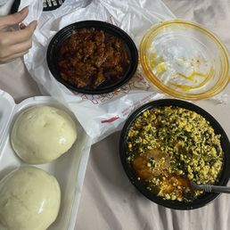 Egusi soup with fried chicken and eggs with spinach Egusi soup with fried chicken and eggs with spinach