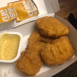 Chicken nuggets cooked beyond cook time. Chicken nuggets cooked beyond cook time.