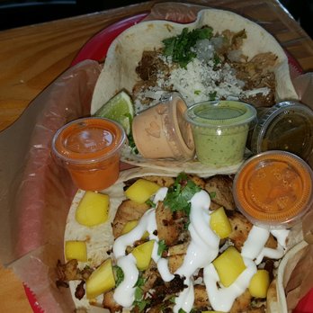 Torchy's Tacos - Jamaican jerk with mango. Green chile pork taco. - Tex-Mex Near Me - Houston, Texas Torchy's Tacos - Jamaican jerk with mango. Green chile pork taco. - Tex-Mex Near Me - Houston, Texas