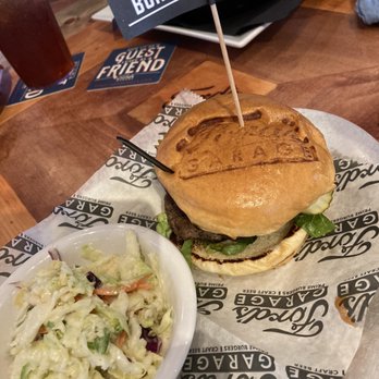 Ford's Garage Plano - Americana Roadster burger -1/3 lb meat. I swapped fries for cole slaw. Excellent flavor! - Burgers Near Me - Plano, Texas Ford's Garage Plano - Americana Roadster burger -1/3 lb meat. I swapped fries for cole slaw. Excellent flavor! - Burgers Near Me - Plano, Texas