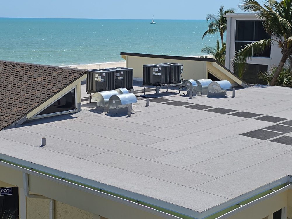 Slide of Rigos Roofing Installers