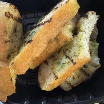Truxton's American Bistro - Pesto buttered bread - New American Near Me - Torrance, California Truxton's American Bistro - Pesto buttered bread - New American Near Me - Torrance, California
