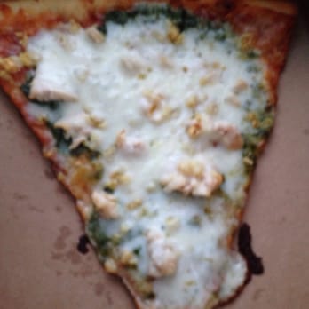 Poor Richard's Restaurant - A chicken pesto garlic slice of pizza - New American Near Me - Colorado Springs, Colorado Poor Richard's Restaurant - A chicken pesto garlic slice of pizza - New American Near Me - Colorado Springs, Colorado