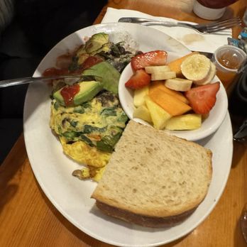 From Scratch Restaurant - Eggs Florentine (added avocado and the local hot sauce) - Breakfast & Brunch Near Me - Carmel, California From Scratch Restaurant - Eggs Florentine (added avocado and the local hot sauce) - Breakfast & Brunch Near Me - Carmel, California