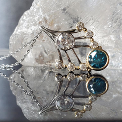 Spencer & Kuehn Fine Jewelry Studio - Blue and white diamond pendant set in platinum and 18k gold