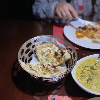 India's Grill Brandon - B2. Garlic Naan - Indian Near Me - Brandon, Florida India's Grill Brandon - B2. Garlic Naan - Indian Near Me - Brandon, Florida