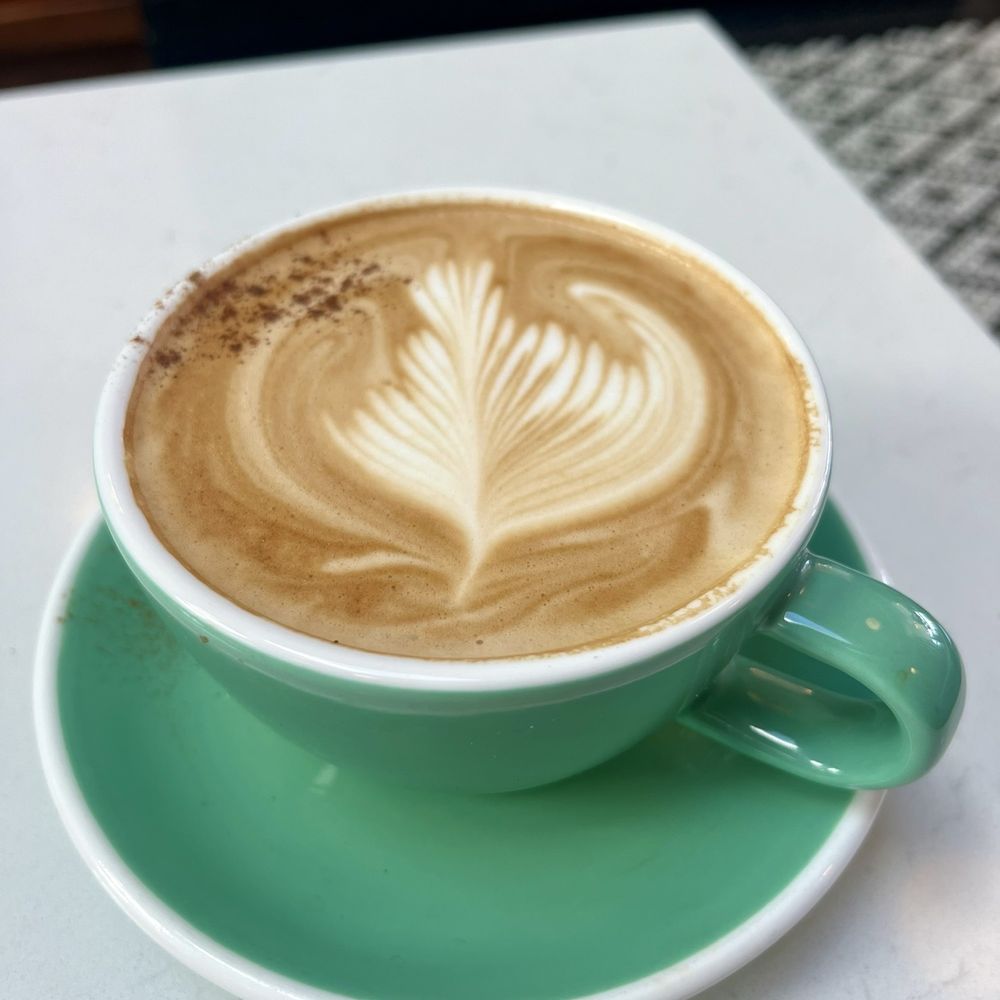 Cafesphere - A mocha with coffee art - Coffee & Tea Near Me - Media, Pennsylvania
