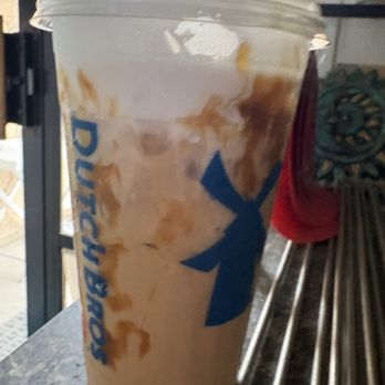 Dutch Bros Coffee - My partially gone Iced Cookie Butter latte- medium- with coconut milk - Juice Bars & Smoothies Near Me - Tucson, Arizona Dutch Bros Coffee - My partially gone Iced Cookie Butter latte- medium- with coconut milk - Juice Bars & Smoothies Near Me - Tucson, Arizona