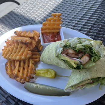Astra Cafe - Spicy Chicken Wrap with Waffle fries - Cafes Near Me - Las Vegas, Nevada Astra Cafe - Spicy Chicken Wrap with Waffle fries - Cafes Near Me - Las Vegas, Nevada