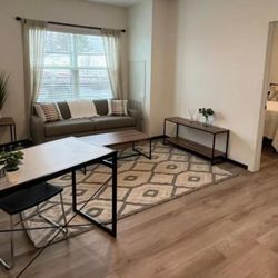 The Annex of Pullman - Fully furnished spacious living room with hardwood floors throughout.