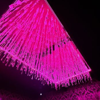 Zenaku - a pink light in the shape of a triangle - Bars Near Me - Houston, Texas