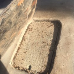 Vince Haro Hauling and Yard Cleanup - sunk after a few weeks, i was given this large bulky metal plate as a "cover"