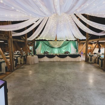 Perfect Events - Stonehaven Barn couples head table backdop and ceiling draping really created an elegant look - Party & Event Planning Near Me - Clive, Iowa Perfect Events - Stonehaven Barn couples head table backdop and ceiling draping really created an elegant look - Party & Event Planning Near Me - Clive, Iowa