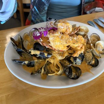 Pezzi Del Mio Cuore - Fettuccine in vodka sauce with lobster tail, mussels and shrimp!!! Super yummy and a gigantic helping - Italian Near Me - San Diego, California Pezzi Del Mio Cuore - Fettuccine in vodka sauce with lobster tail, mussels and shrimp!!! Super yummy and a gigantic helping - Italian Near Me - San Diego, California