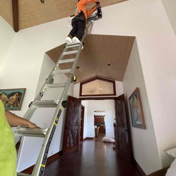 Cooling Hawaii - Aslen at a home in Haiku with Ray Catchapiro holding the ladder. - Heating & Air Conditioning/HVAC Near Me - Puunene, Hawaii Cooling Hawaii - Aslen at a home in Haiku with Ray Catchapiro holding the ladder. - Heating & Air Conditioning/HVAC Near Me - Puunene, Hawaii