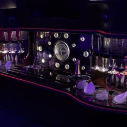 Danny Boy Limousine - White Escalade Stretch 20 Passenger.