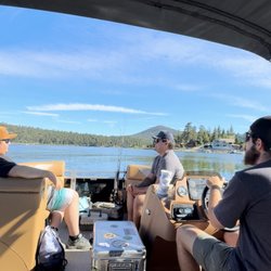 Standard size pontoon boat fishing on the lake