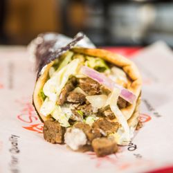 Lamb gyro with your choice of salad and sauces