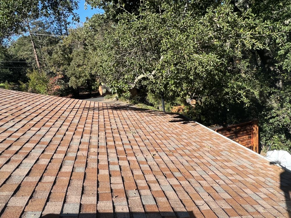 Slide of Everest Roofing