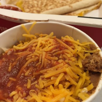 Taco John's - Side of beans and cheese. Tasty! - Mexican Near Me - Evansville, Indiana Taco John's - Side of beans and cheese. Tasty! - Mexican Near Me - Evansville, Indiana