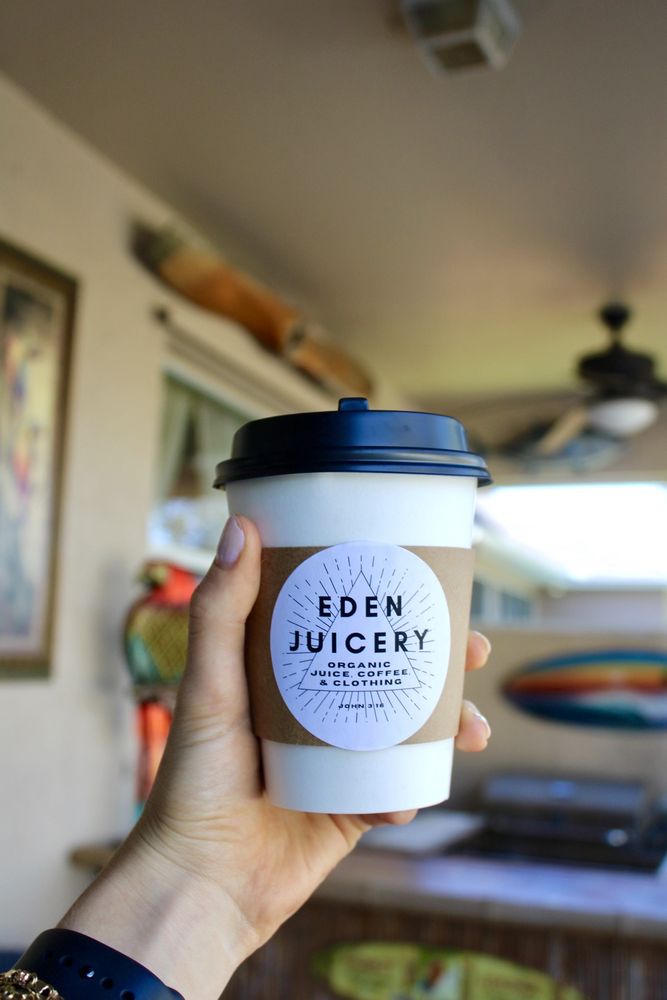 The Garden of Eden Juicery and Cafe Logo