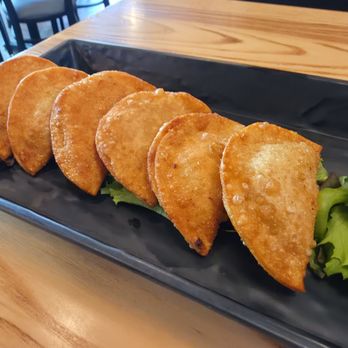 Smuggler's North Shore - Duck fat Wontons - Bars Near Me - Newaygo, Michigan Smuggler's North Shore - Duck fat Wontons - Bars Near Me - Newaygo, Michigan
