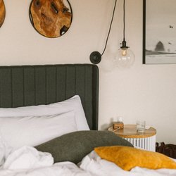 Cozy bed at Inn at Manzanita [Luxe Inn King]