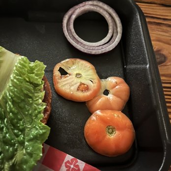 Puck’s Pub - a sandwich with lettuce and tomatoes - Sports Bars Near Me - Lake Bluff, Illinois Puck’s Pub - a sandwich with lettuce and tomatoes - Sports Bars Near Me - Lake Bluff, Illinois