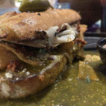 Vecindad de Seattle - Torta de Chilaquiles Verdes con chorizo--my death row sandwich. - Mexican Near Me - Tacoma, Washington Vecindad de Seattle - Torta de Chilaquiles Verdes con chorizo--my death row sandwich. - Mexican Near Me - Tacoma, Washington