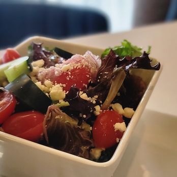 seven restaurant - a salad in a square bowl - New American Near Me - Clayton, Missouri