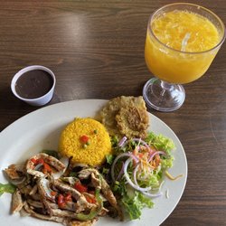 Havana South Cuban Restaurant & Bar - Mango juice, pollo a la Havana with yellow rice and black beans
