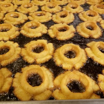 Donut Palace - a tray of doughnuts being cooked - Donuts Near Me - Barnesville, Georgia
