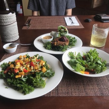 Sun Belly Cafe - Butternut squash "steak" over greens with side salad, veggie burger of the day with chutney and a summer roll. - Vegetarian Near Me - Greenville, South Carolina