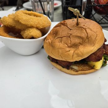 Broken Yolk Cafe - Aloha Crispy Chicken Sandwich and Onion Rings - Breakfast & Brunch Near Me - Rancho Cucamonga, California Broken Yolk Cafe - Aloha Crispy Chicken Sandwich and Onion Rings - Breakfast & Brunch Near Me - Rancho Cucamonga, California