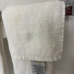 Quality Inn & Suites - Unclean towels. Definitely not changed.