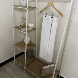 Area to put your belongings, a towel to wear during your treatment Area to put your belongings, a towel to wear during your treatment