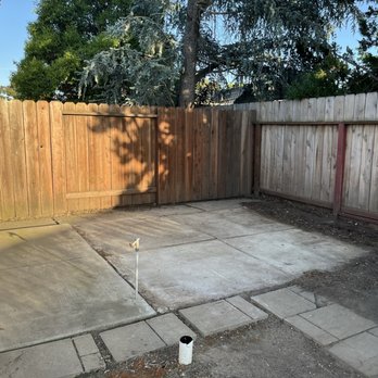Ceglio Concrete - Before: Old shed pad after shed demo (shed pad is visibly uneven) - Masonry/Concrete Near Me - Livermore, California