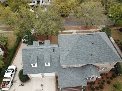 Slide of LandShark Roofing