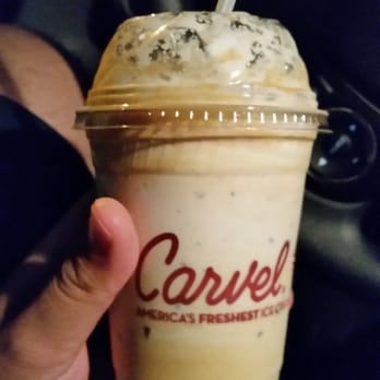 Carvel - a hand holding a cup of coffee - Ice Cream & Frozen Yogurt Near Me - Bronx, New York Carvel - a hand holding a cup of coffee - Ice Cream & Frozen Yogurt Near Me - Bronx, New York